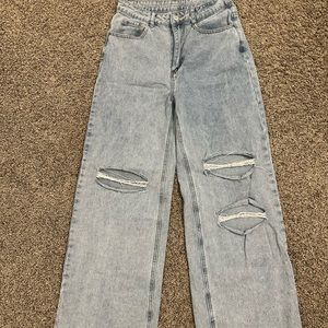 Baggy ripped jeans.